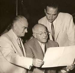 Here, Dr. Curtis (right) is pictured on the set of The Ten Commandments with Dr. Ernest Holmes and Cecil B. DeMille.